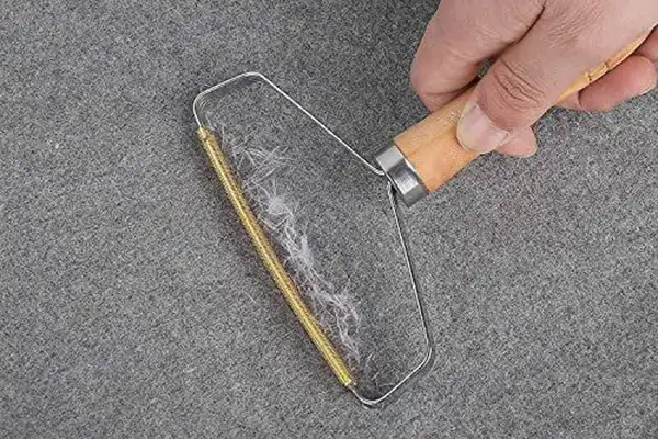 چرا فرش پرز می‌ده؟ علت پرز زیاد فرش چیست؟